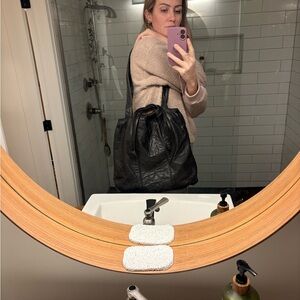 Vintage Black Leather Tote Bag with Drawstring Closure